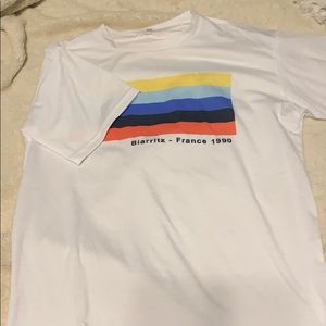 White tee with cute rainbow details!